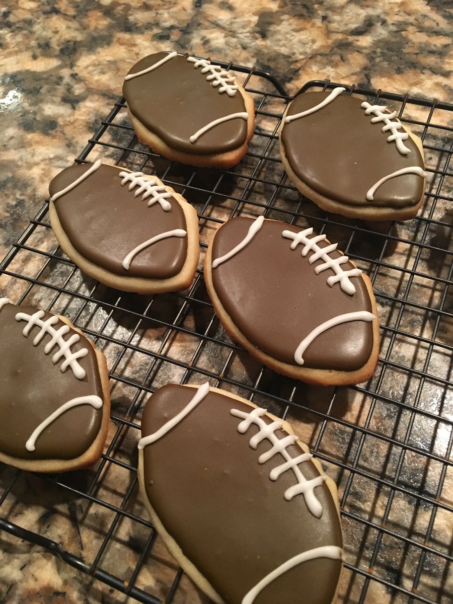 Closeup of the football decorated sugar cookies.