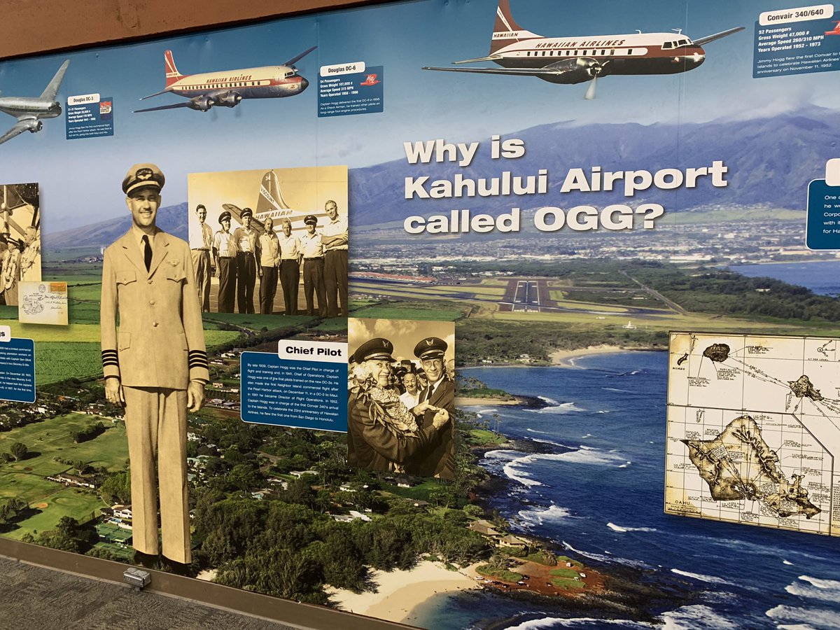 A mural with facts and a large question, “Why is Kahului Airport called OGG?”