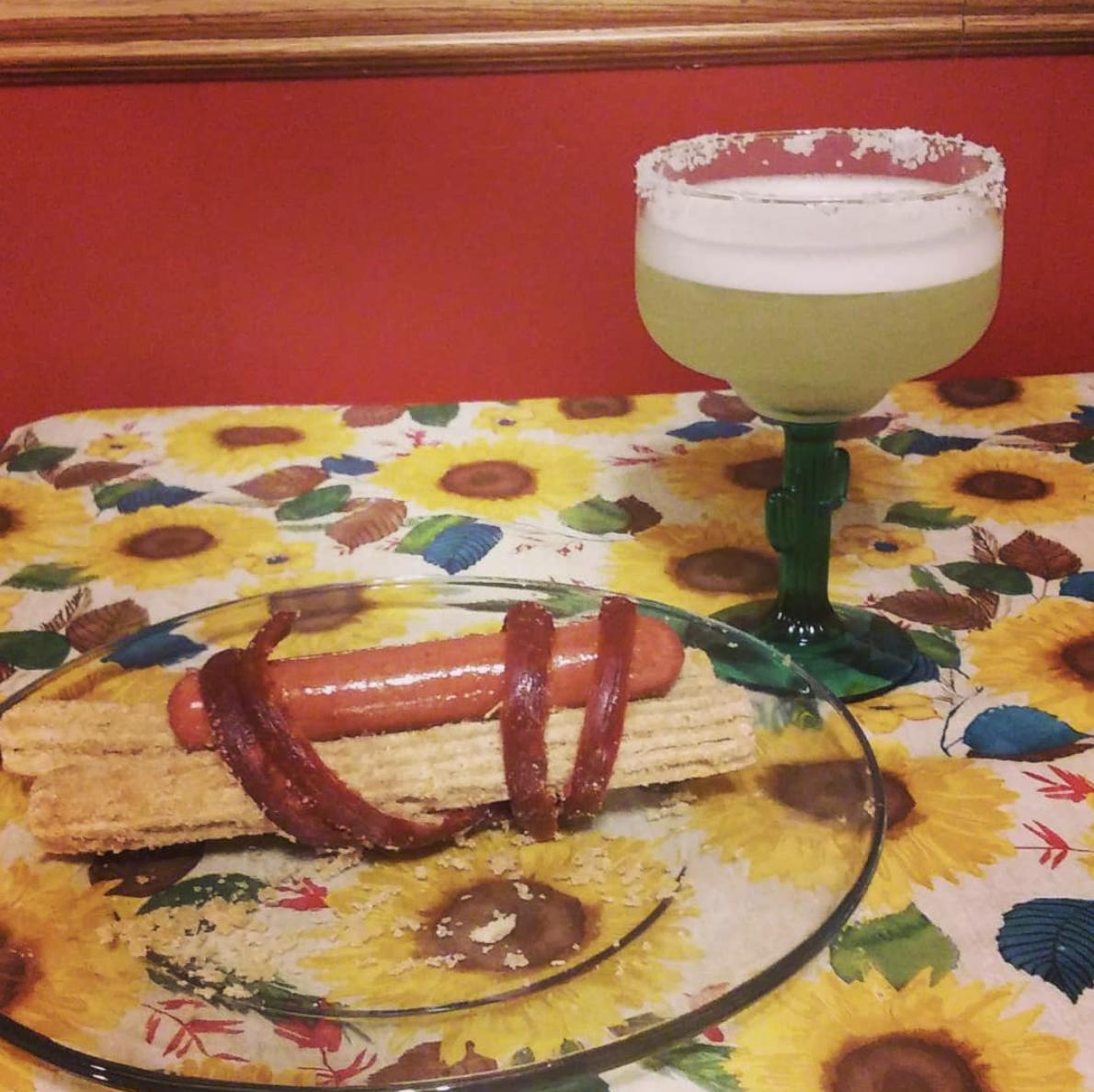 A hotdog but the bun is two churros, tied together with a Slim Jim.
