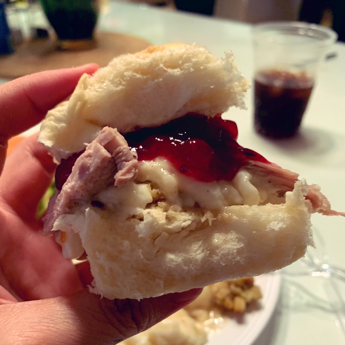 Thanksgiving sandwich with turkey, mashed taters, and lingonberry jam.