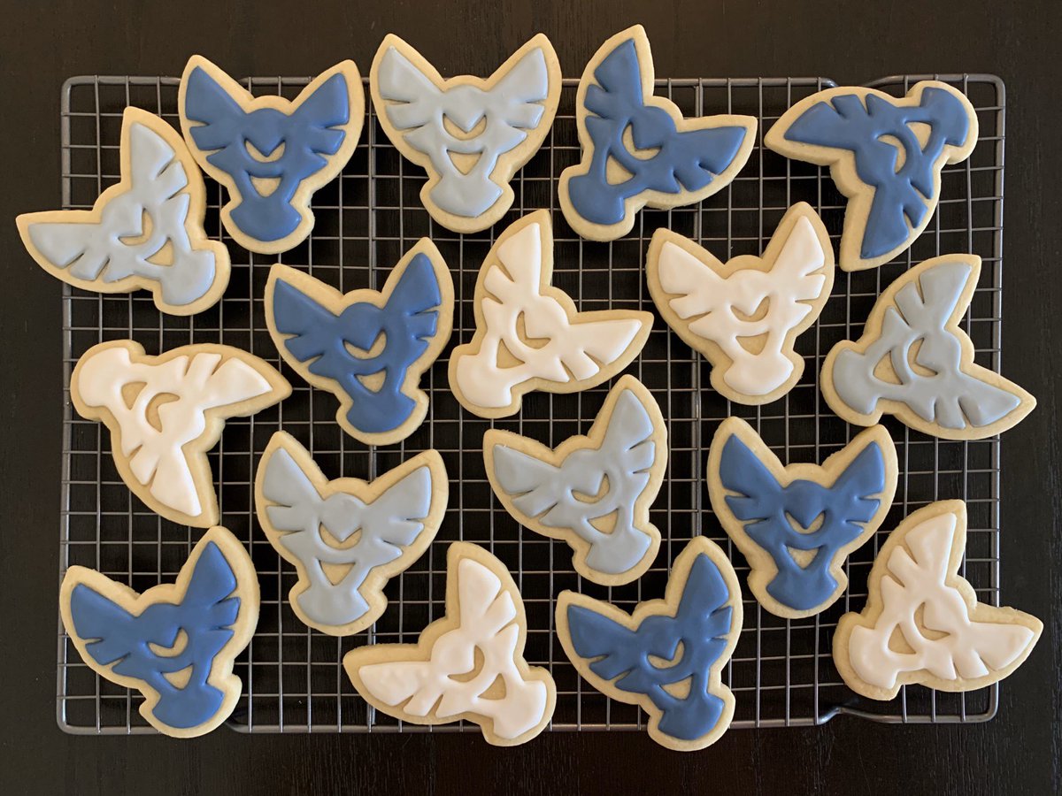 Iced cookies in the shape of an owl, Monomyth’s logo.