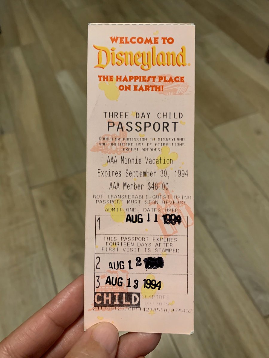 Disneyland passport from 1994 with stamped dates.