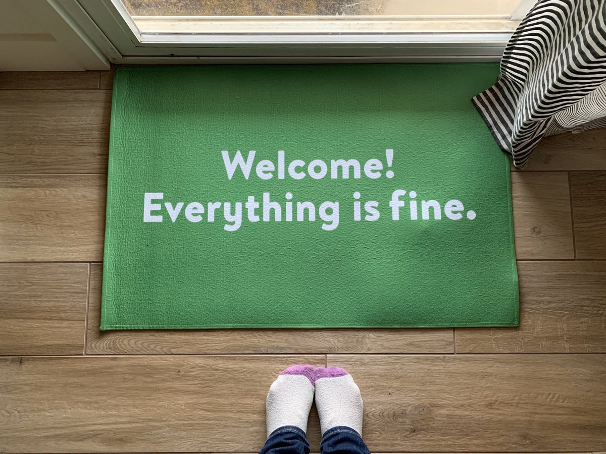 The Good Place doormat that says “Welcome! Everything is fine.”