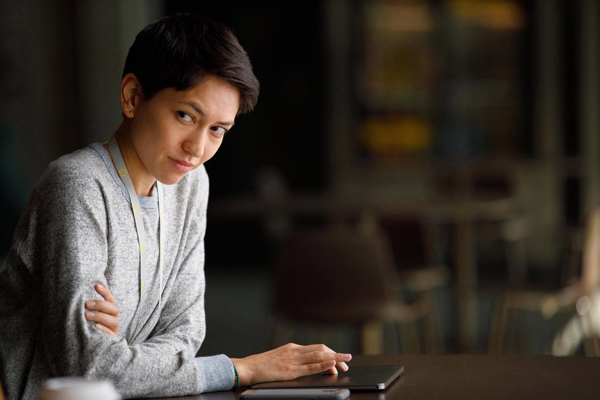 Sonoya Mizuno in a comfy sweater and short pixie haircut.