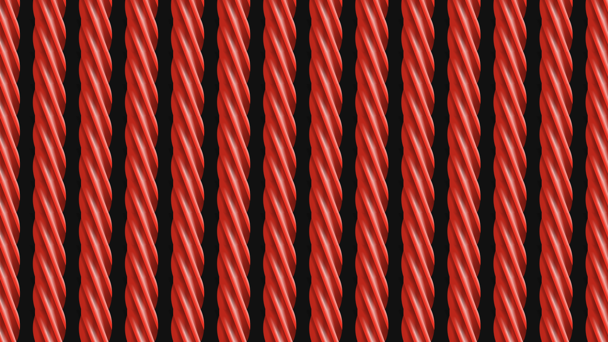 Repeating pattern of vertical pieces of red licorice.