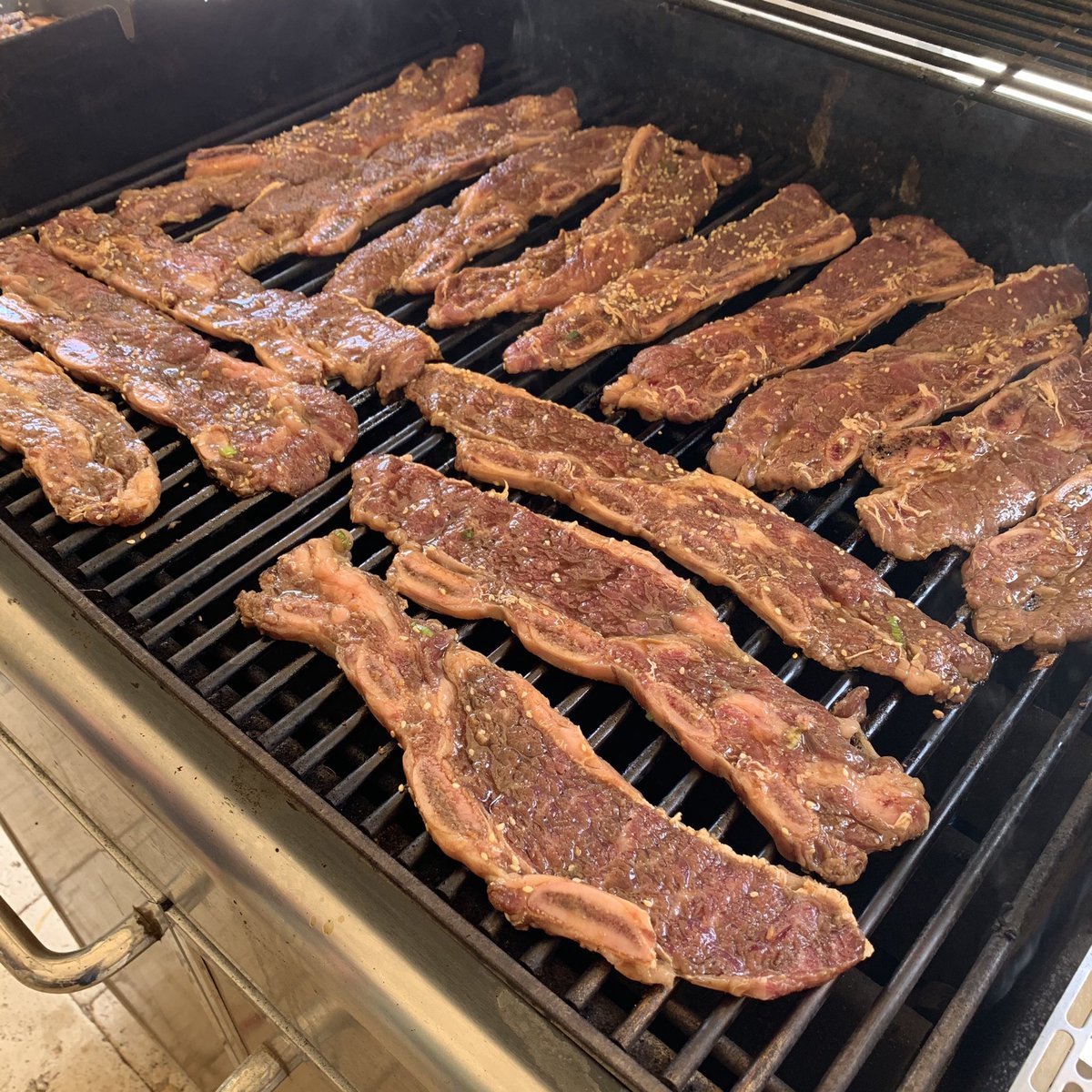 Beef short ribs on a grill