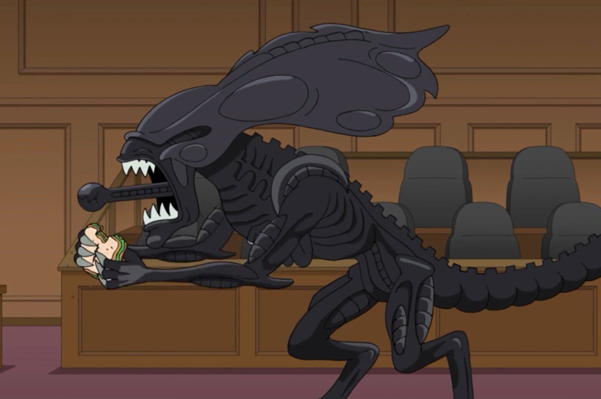 Xenomorph from Alien enjoying a sandwich.