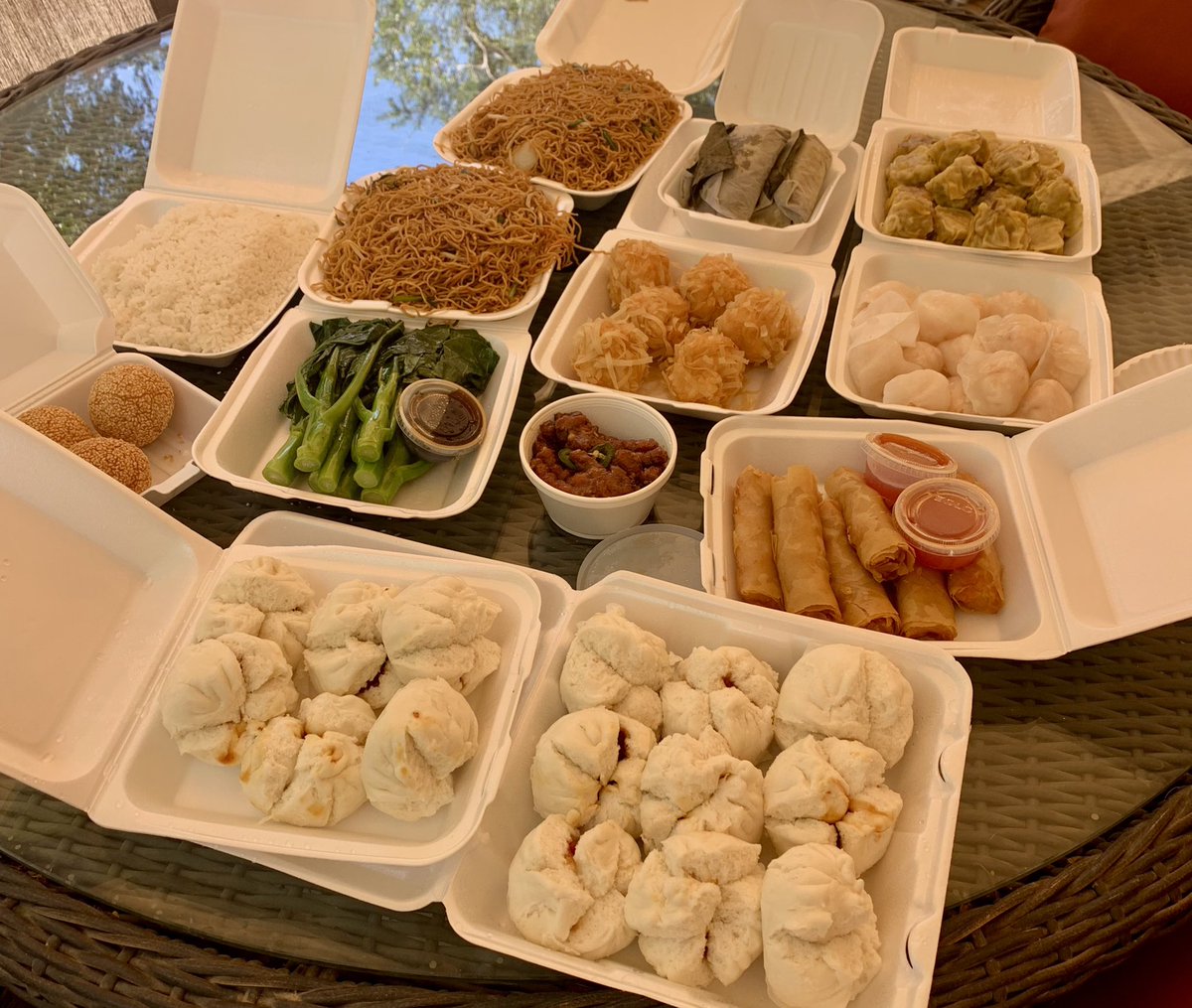 a big spread of dim sum including bao, dumplings, noodles and other good stuff