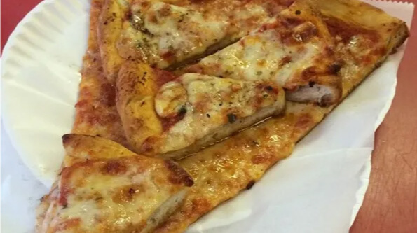 slice of pizza with tiny pizza slices on it