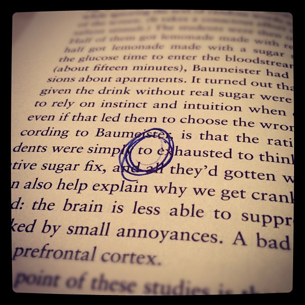 book page with a typo circled in pen