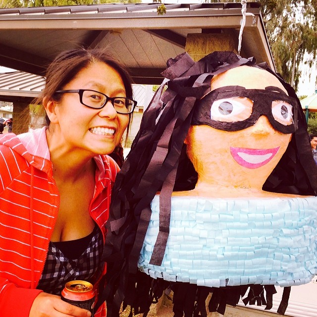 Lynn with a piñata that looks like her