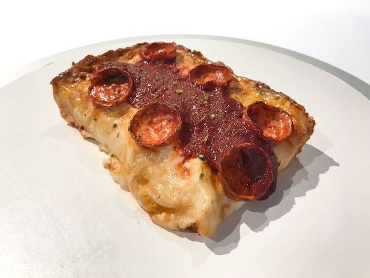 Detroit-style slice of pizza