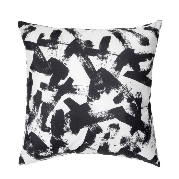 a white throw pillow with similar painterly overlappping strokes