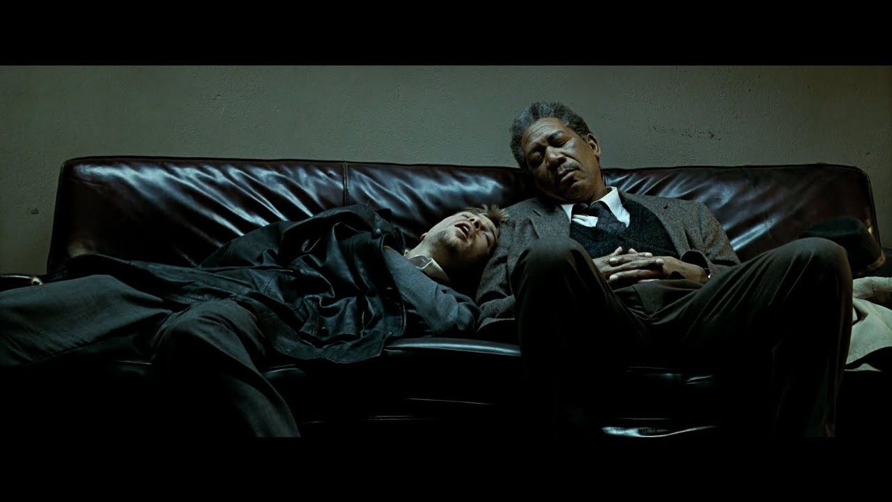 Brad Pitt and Morgan Freeman (in Seven) asleep on a couch