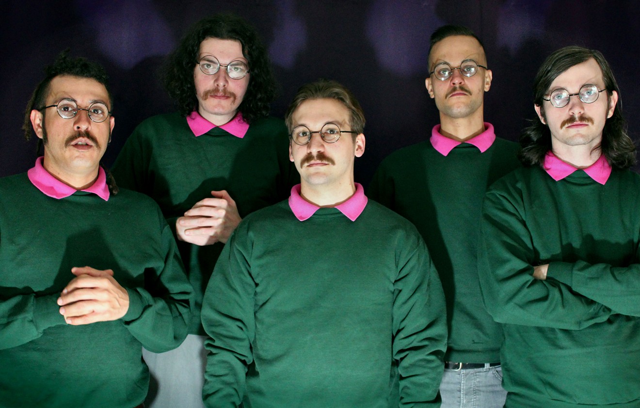 five white dudes with mustaches wearing green sweaters over pink polos